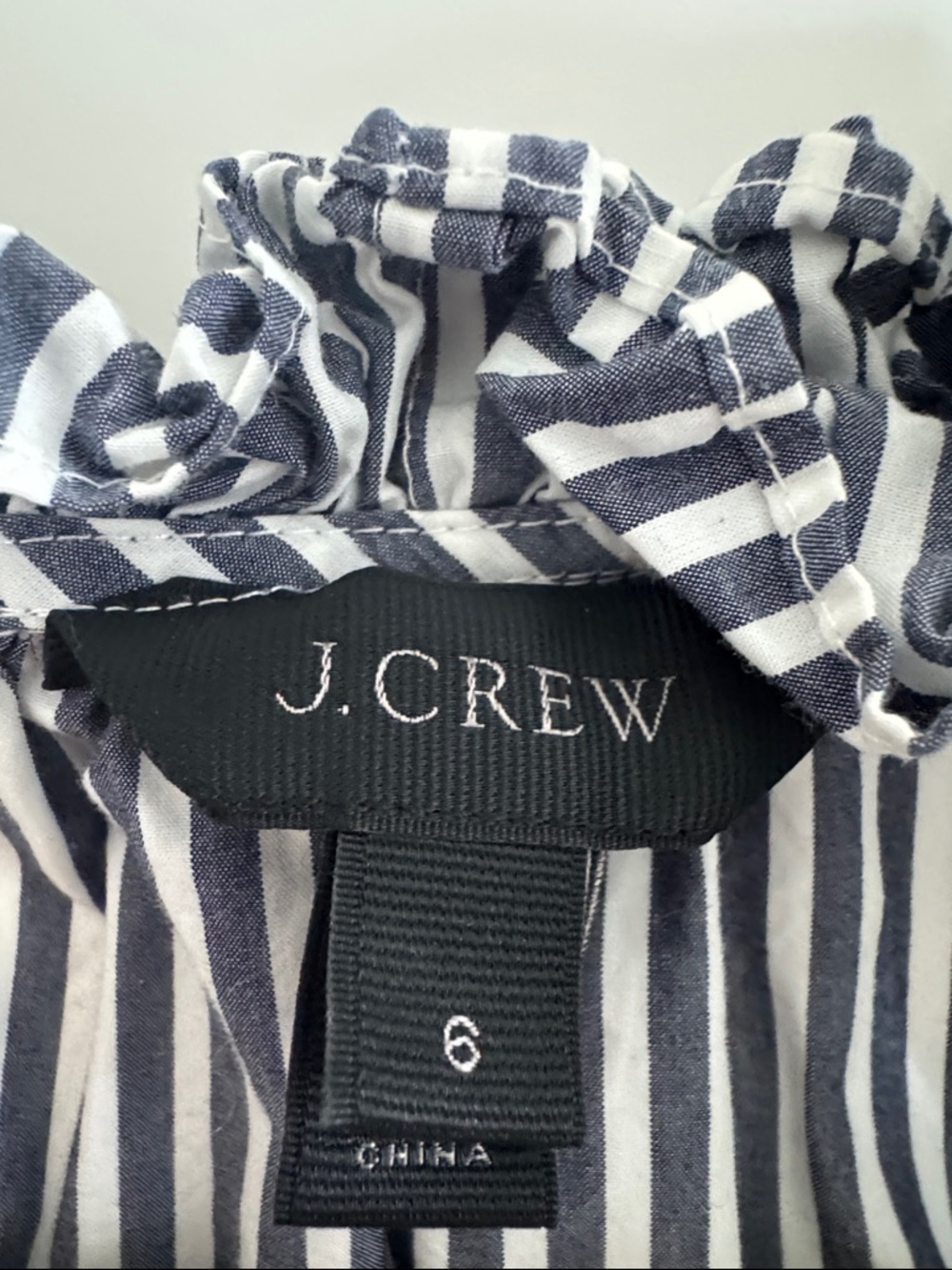 J. CREW! Navy & White Striped Ruffle sleeveless blouse w/discreet top button. - Picture 2 of 3